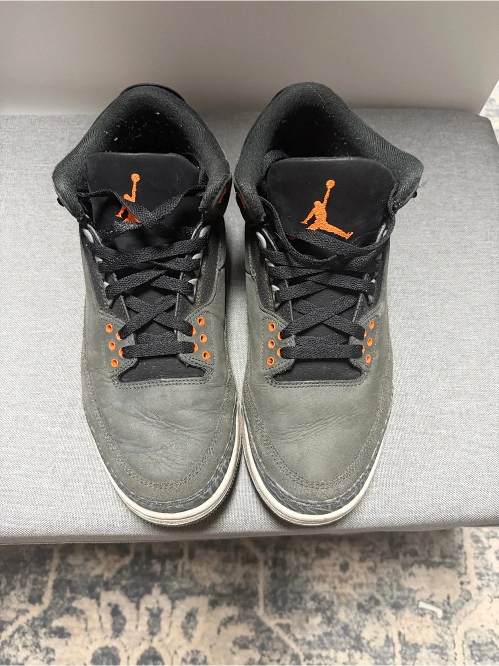 Retro 3 Jordan Men’s Black Sneakers with Orange Jumpman Accents